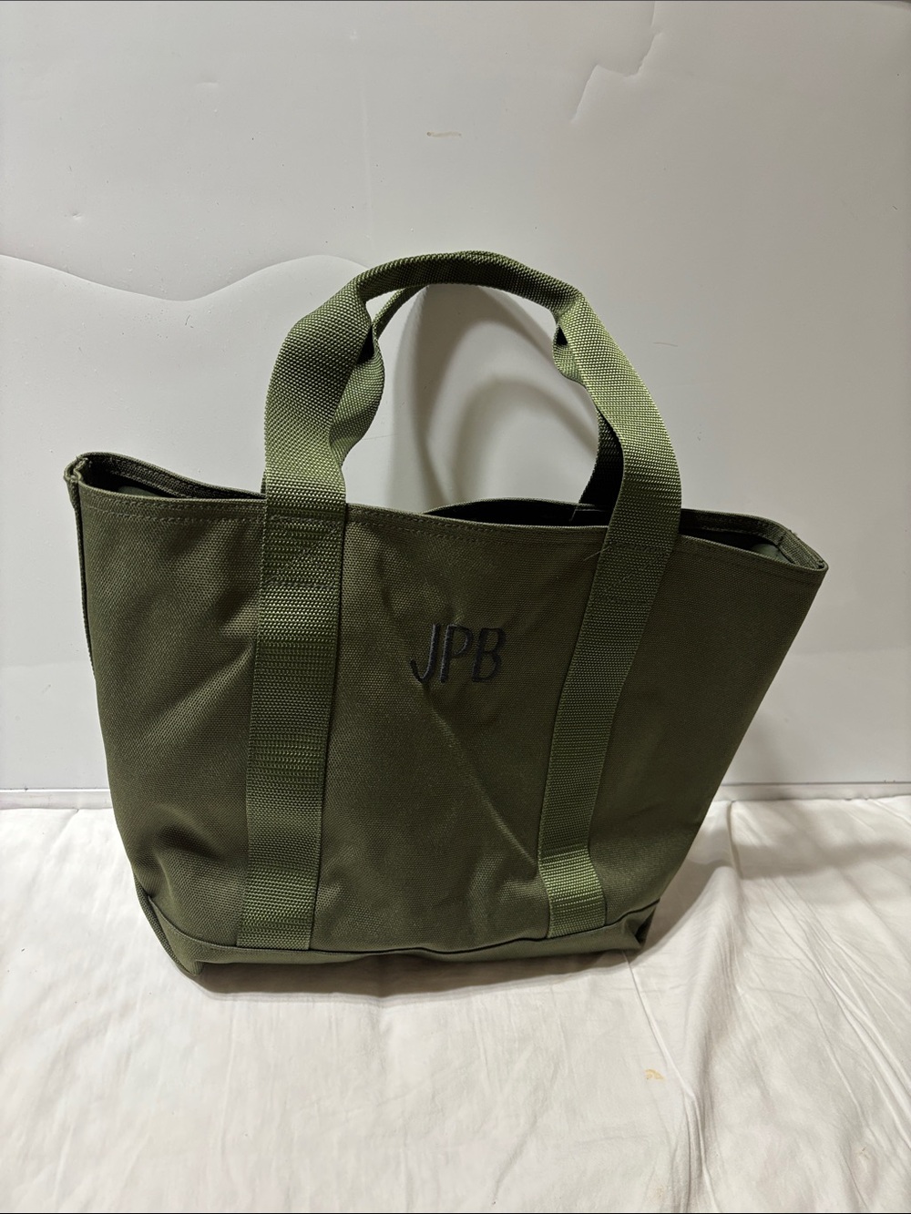 L.L. Bean Green waterproof open top top. Preowned and like new!